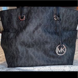 Black Michael Kors Purse With MK’s